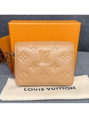 Louis Vuitton Lou (coussin) wallet monogram empreinte leather CAMEL